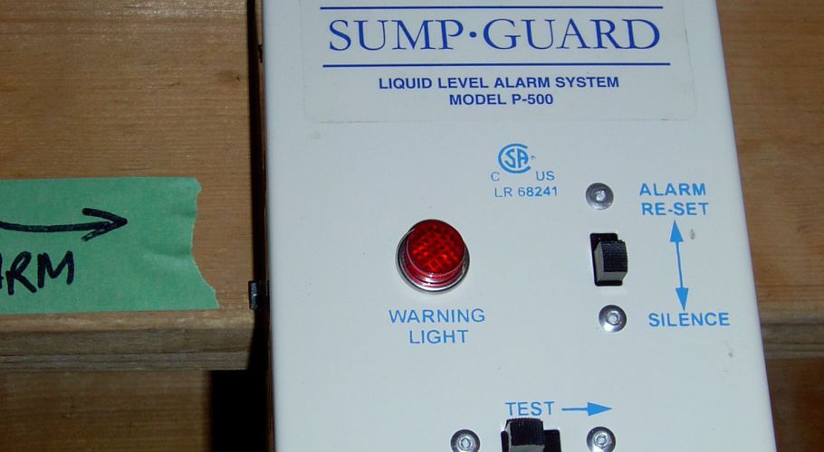 Water level alarm on storage tank